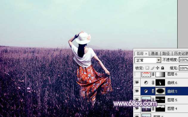 ‘Photoshop为旷野中的人物调制出流行的暗蓝色‘
