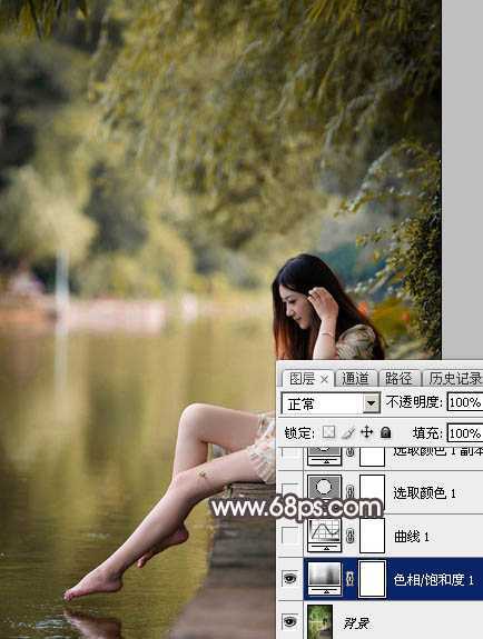 ‘Photoshop将水边的美女增加暗调红褐色‘