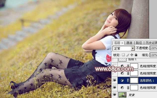 ‘Photoshop为依靠树干的美女调制出早秋黄褐色‘