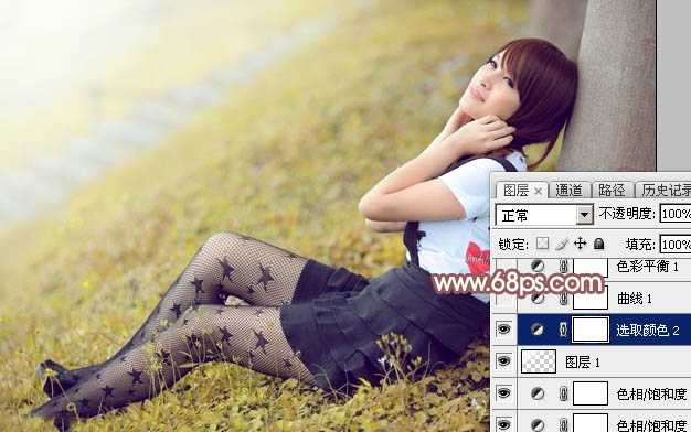 ‘Photoshop为依靠树干的美女调制出早秋黄褐色‘