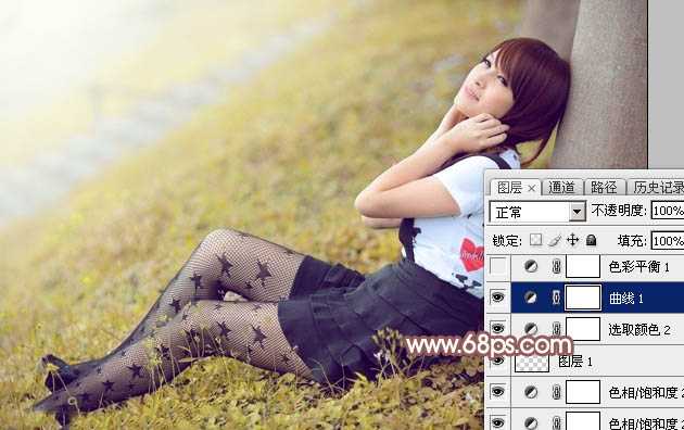 ‘Photoshop为依靠树干的美女调制出早秋黄褐色‘