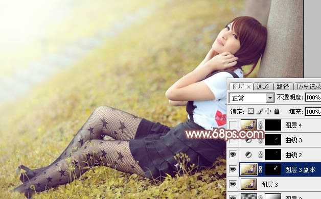 ‘Photoshop为依靠树干的美女调制出早秋黄褐色‘