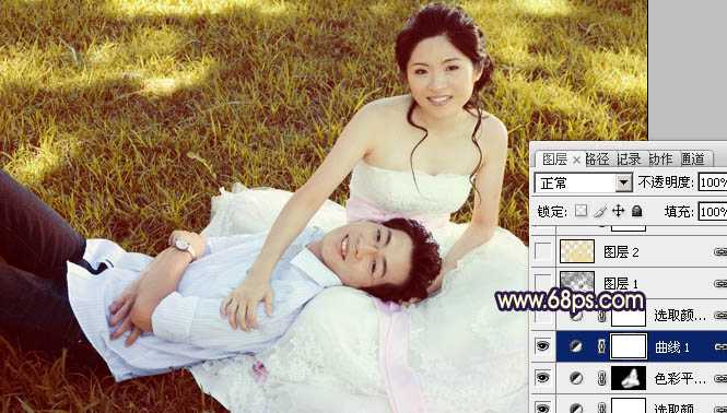 ‘Photoshop将草地婚片调成漂亮的暖调黄褐色‘