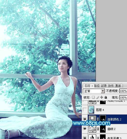‘Photoshop为窗户边上的美女图片调制出梦幻的青绿色‘