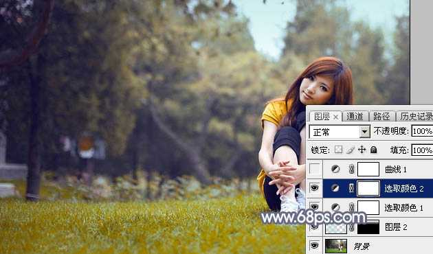 ‘Photoshop将草地上的美女调制出清爽甜美的黄蓝色‘