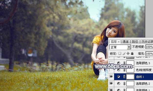 ‘Photoshop将草地上的美女调制出清爽甜美的黄蓝色‘