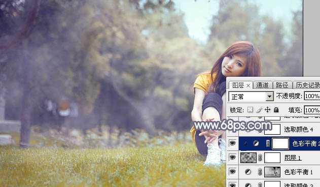 ‘Photoshop将草地上的美女调制出清爽甜美的黄蓝色‘