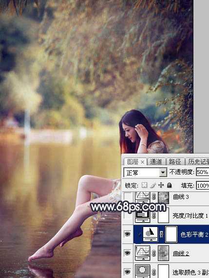 ‘Photoshop为水景人物图片打造艳丽的秋季暖色特效‘