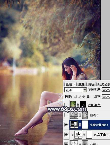 ‘Photoshop为水景人物图片打造艳丽的秋季暖色特效‘