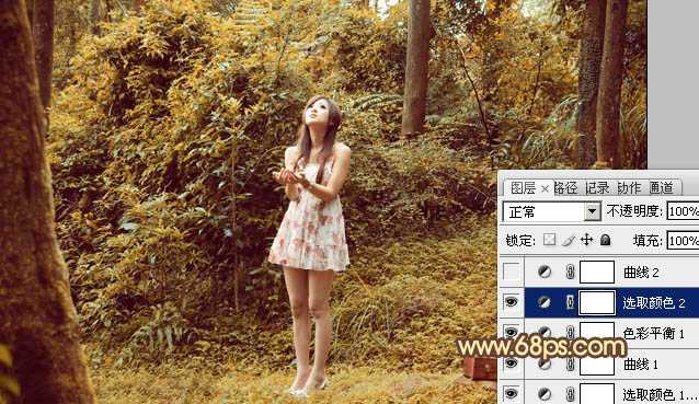 ‘Photoshop将树林美女图片调制出梦幻的橙褐色‘