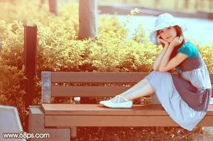 ‘Photoshop为坐在公园椅子上的美女图片增加流行的韩系黄褐色‘