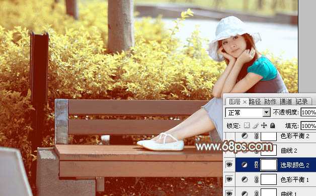 ‘Photoshop为坐在公园椅子上的美女图片增加流行的韩系黄褐色‘