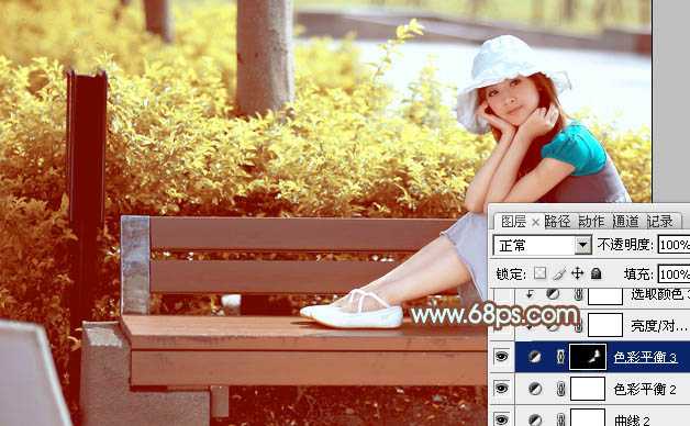 ‘Photoshop为坐在公园椅子上的美女图片增加流行的韩系黄褐色‘
