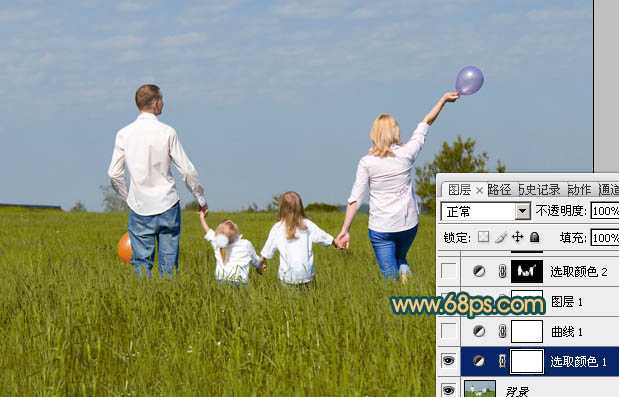 ‘Photoshop下将草地人物图片调成柔美的暗调橙红色‘