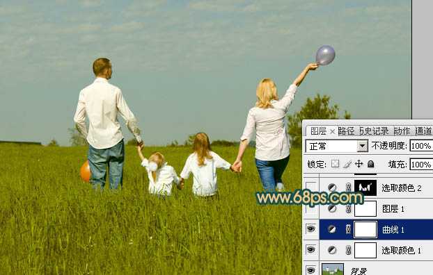 ‘Photoshop下将草地人物图片调成柔美的暗调橙红色‘