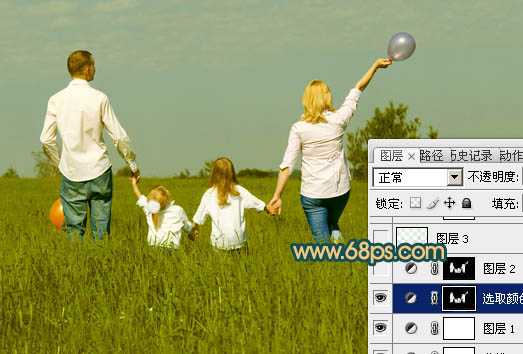 ‘Photoshop下将草地人物图片调成柔美的暗调橙红色‘