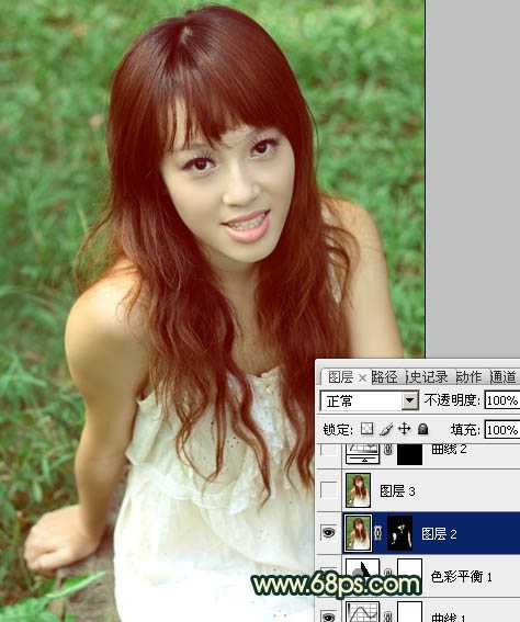 ‘Photoshop将草地人物图片调制出柔美的棕绿色效果‘