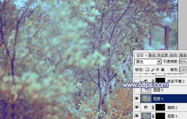 ‘Photoshop为树林人物图片增加上唯美的韩系淡蓝色效果‘