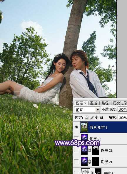 ‘Photoshop调出浪漫的星空背景草地情侣图片‘