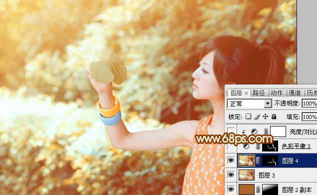 ‘Photoshop将绿树边的美女图片调出暖暖的唯美阳光色‘