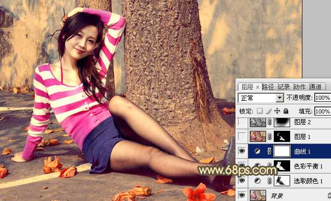 ‘Photoshop为坐路面上的人物图片调制出颓废的暖色调‘