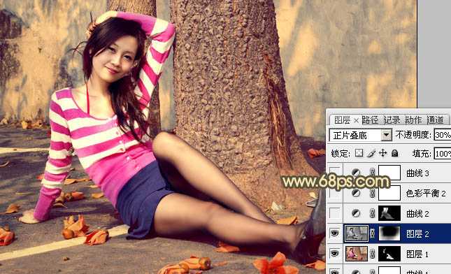 ‘Photoshop为坐路面上的人物图片调制出颓废的暖色调‘