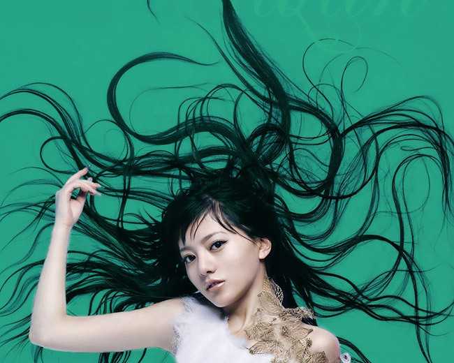 ‘photoshop利用抽出滤镜抠出背景单色发丝较多的人物图片‘