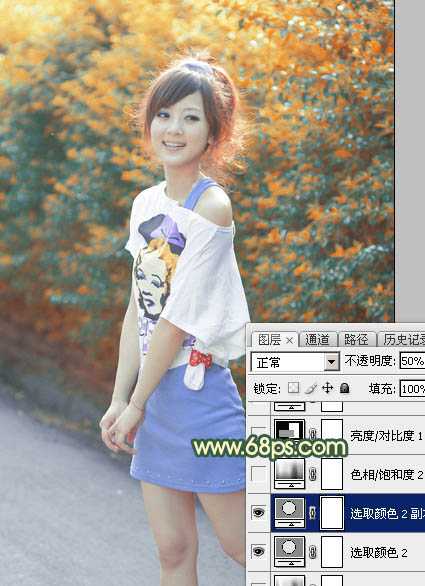 ‘Photoshop为绿植边的美女调出漂亮的秋季暗调暖色‘