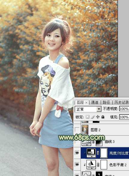 ‘Photoshop为绿植边的美女调出漂亮的秋季暗调暖色‘