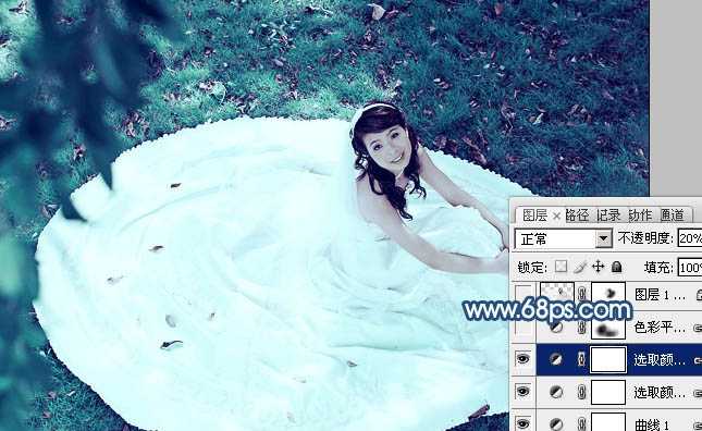 ‘Photoshop将草地婚纱美女调制出流行的青蓝色‘