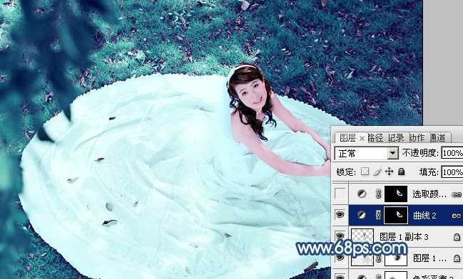 ‘Photoshop将草地婚纱美女调制出流行的青蓝色‘