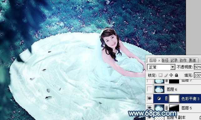 ‘Photoshop将草地婚纱美女调制出流行的青蓝色‘