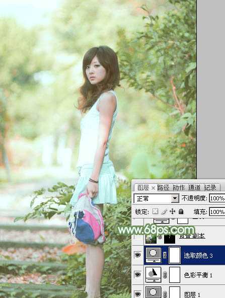 ‘Photoshop将树边美女图片调制出唯美的淡调嫩绿色‘