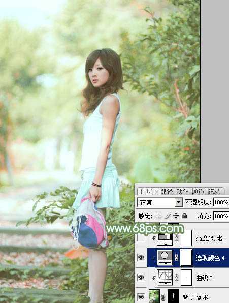 ‘Photoshop将树边美女图片调制出唯美的淡调嫩绿色‘