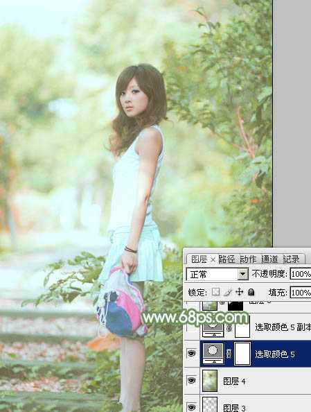 ‘Photoshop将树边美女图片调制出唯美的淡调嫩绿色‘