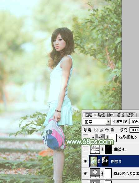 ‘Photoshop将树边美女图片调制出唯美的淡调嫩绿色‘