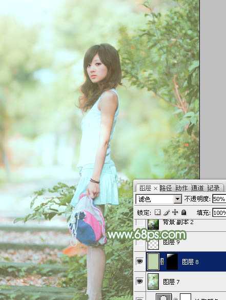 ‘Photoshop将树边美女图片调制出唯美的淡调嫩绿色‘