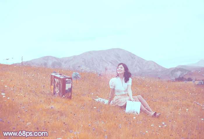 ‘Photoshop将草地美女增加上淡淡的蓝红色‘