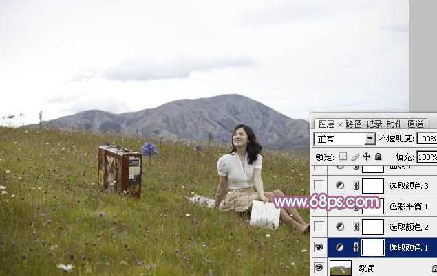 ‘Photoshop将草地美女增加上淡淡的蓝红色‘