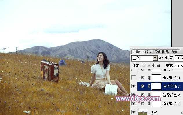 ‘Photoshop将草地美女增加上淡淡的蓝红色‘