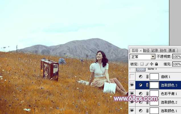 ‘Photoshop将草地美女增加上淡淡的蓝红色‘