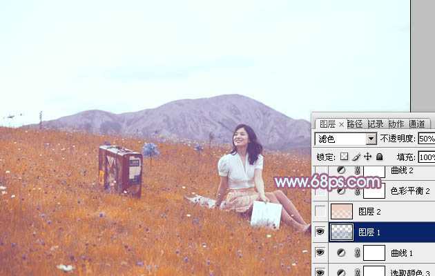 ‘Photoshop将草地美女增加上淡淡的蓝红色‘