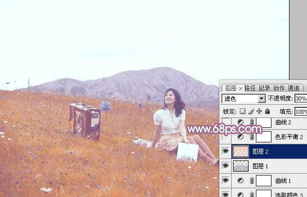 ‘Photoshop将草地美女增加上淡淡的蓝红色‘