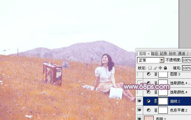 ‘Photoshop将草地美女增加上淡淡的蓝红色‘