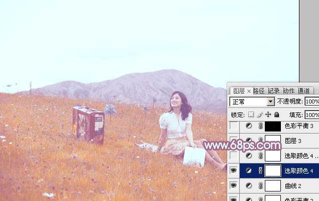 ‘Photoshop将草地美女增加上淡淡的蓝红色‘