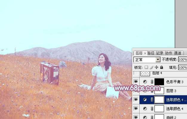 ‘Photoshop将草地美女增加上淡淡的蓝红色‘