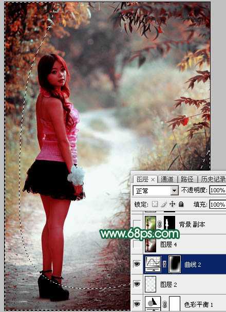 ‘Photoshop调出暗调秋季青红色树林人物图片‘