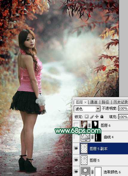 ‘Photoshop调出暗调秋季青红色树林人物图片‘