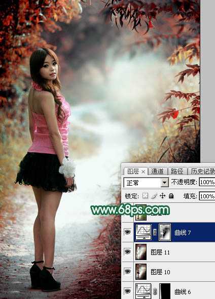 ‘Photoshop调出暗调秋季青红色树林人物图片‘