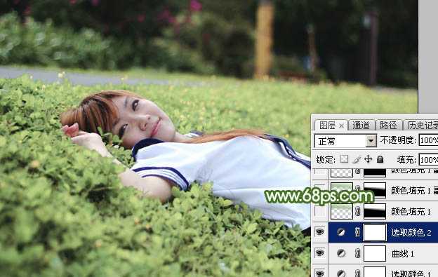 ‘Photoshop将草地上的美女图片增加唯美的春季粉绿色‘